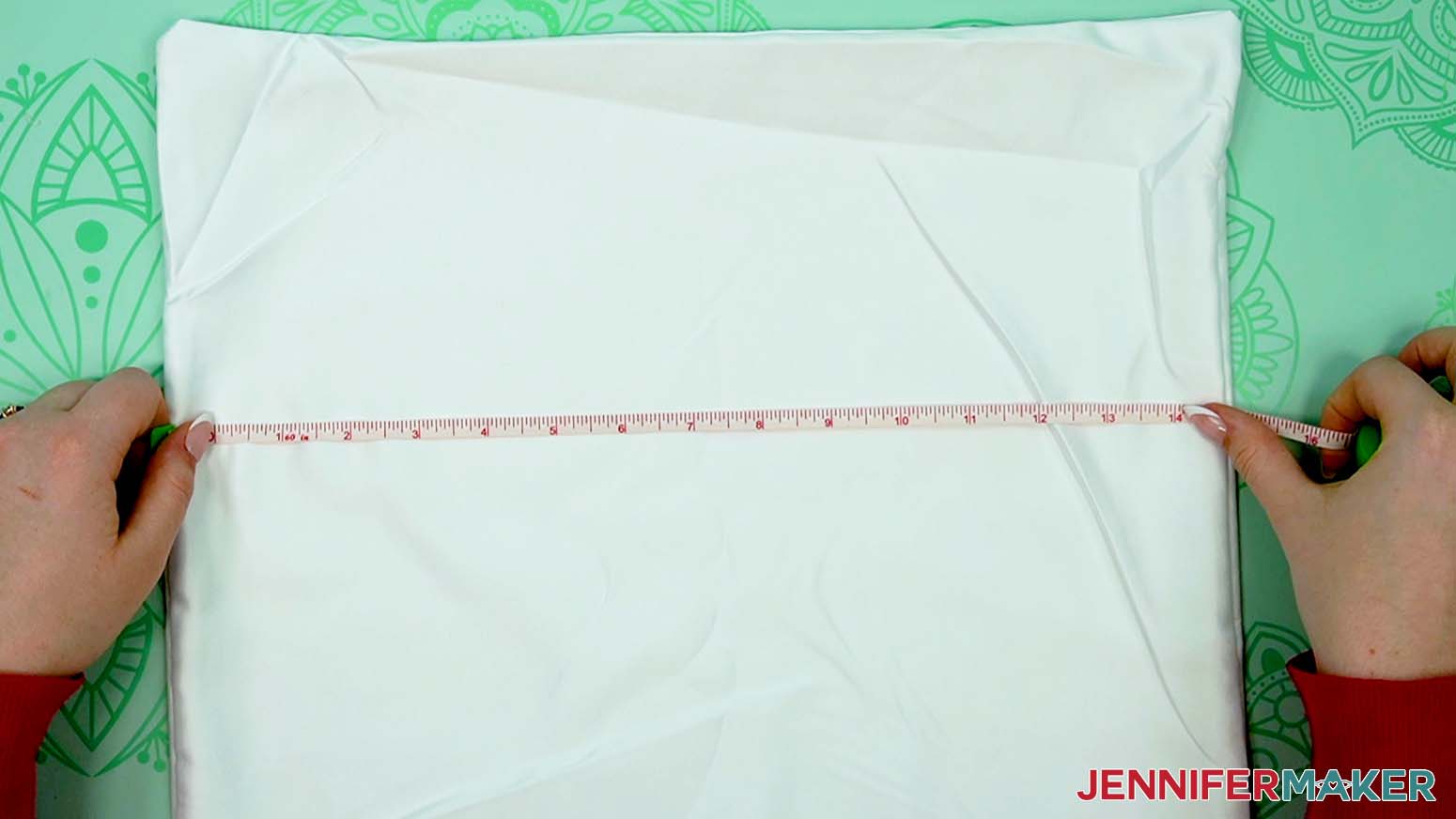 Use a tape measure to verify the size of the blank sublimation pillow case.