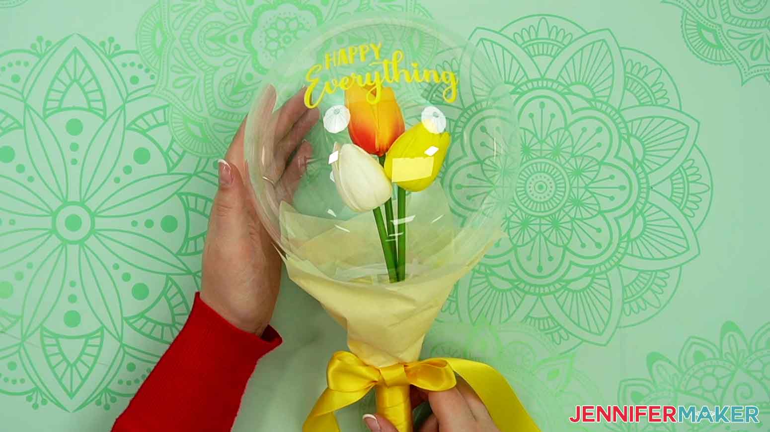 Complete small handheld flower balloon bouquet.