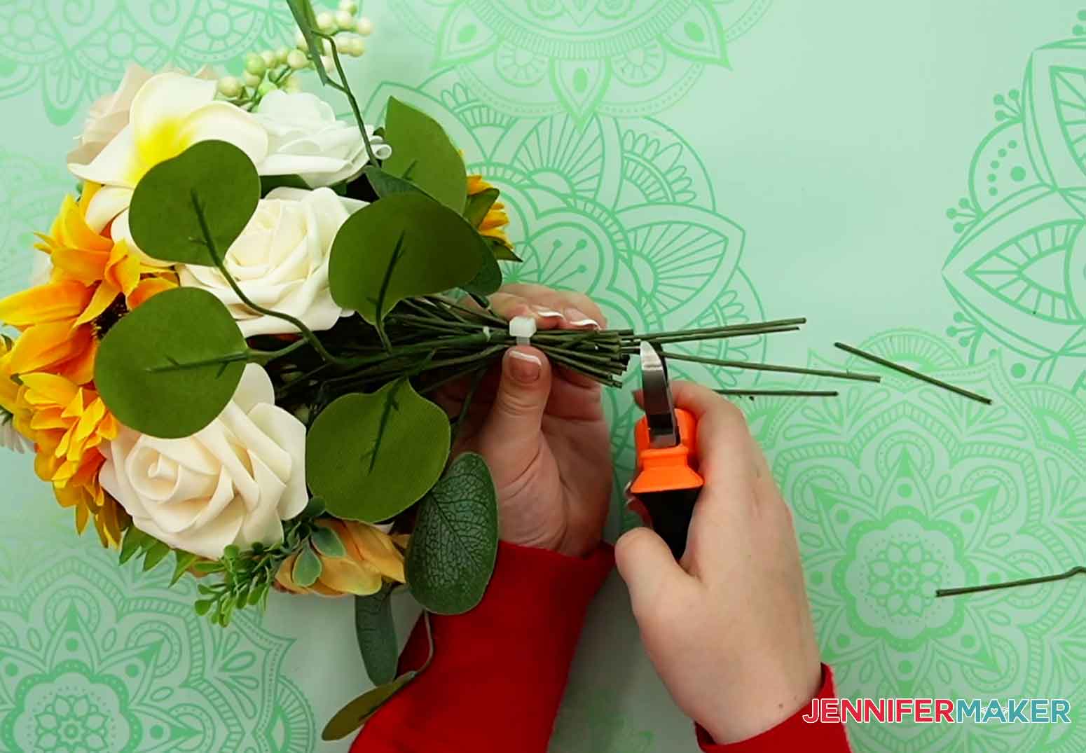 Use heavy duty wire cutters to trim away the excess stems to be about an inch below the zip tie.
