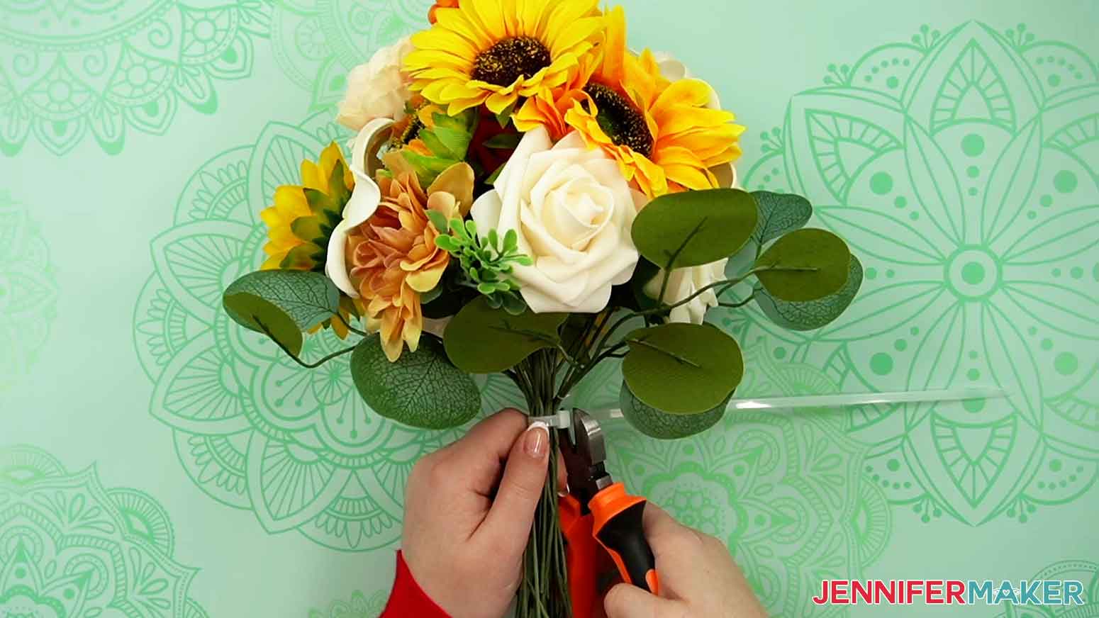 Attach a zip tie to the base of the bouquet to secure the placement of the flowers.