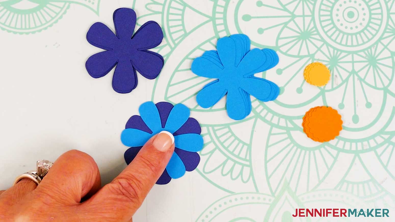 Add the large front petal piece on top of the large back petal piece, staggering the petals.