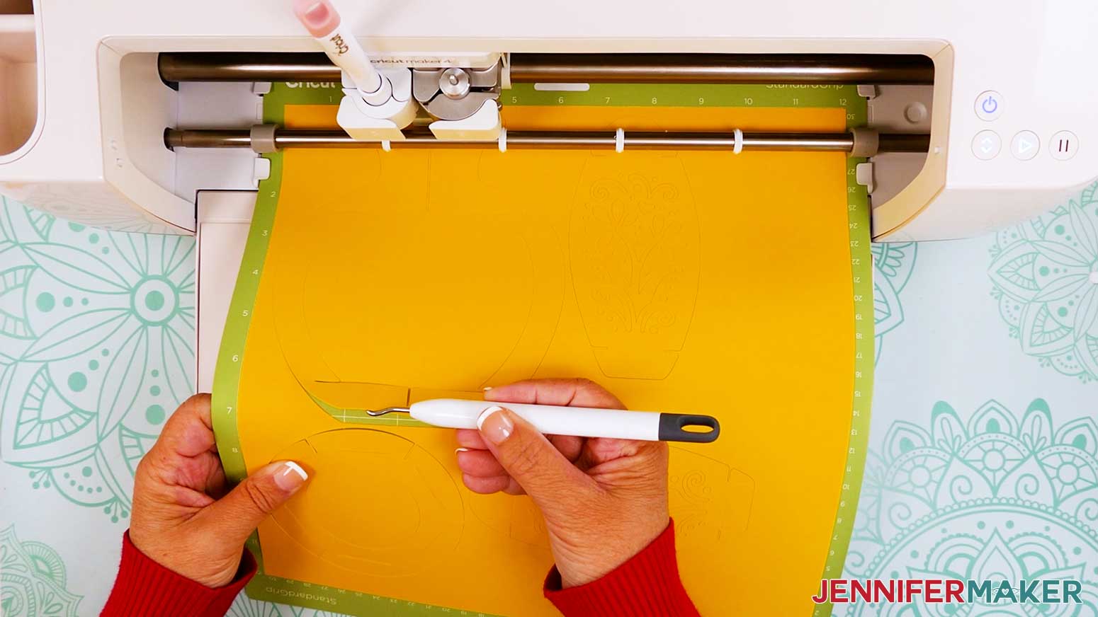 Use a weeding tool to lift the corner of the cardstock to check that the cuts went all the way through.