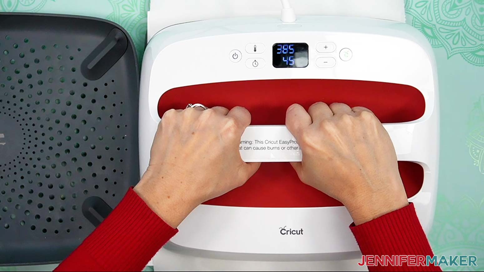 Lower the press straight down on the design and heat it for 45 seconds with light pressure.