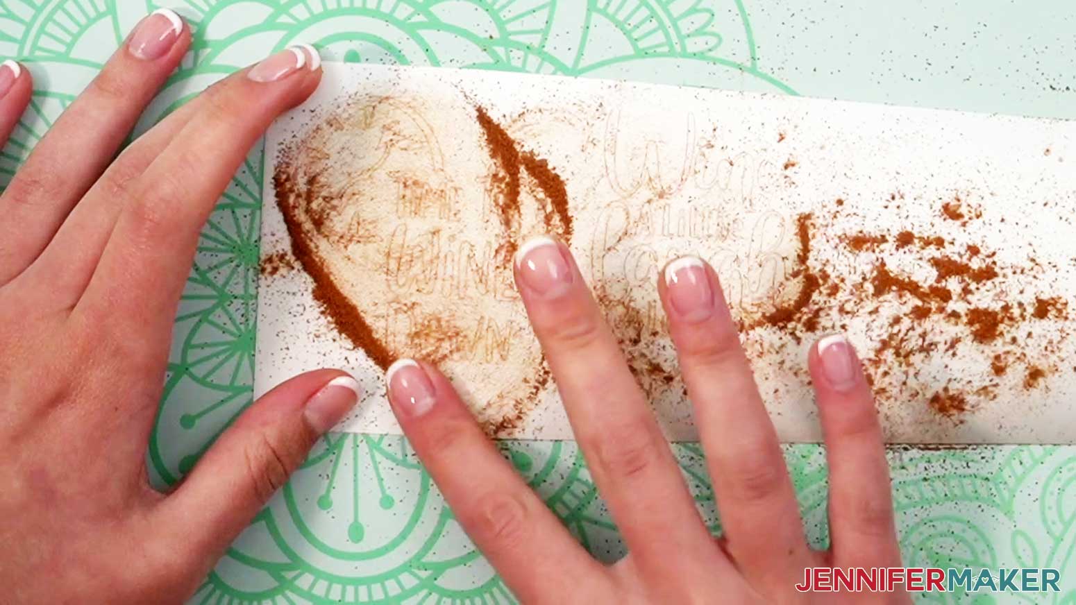 Rub the cinnamon powder into the cracks where the vinyl is cut to make it easier to weed.