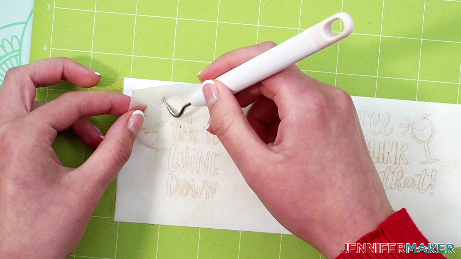 Use a weeding tool to pull away the excess vinyl carefully.