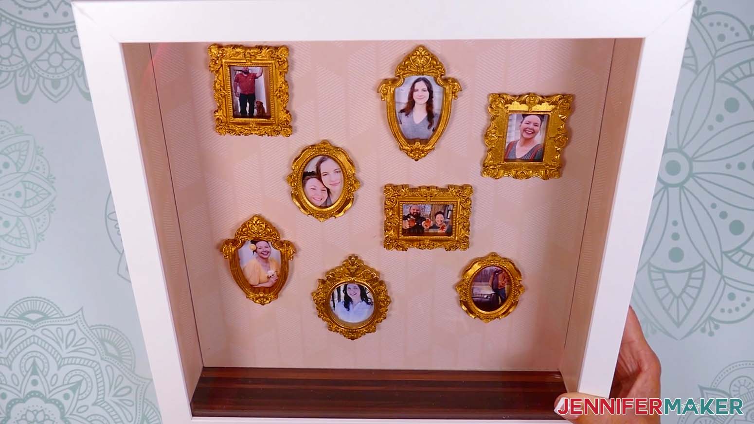 All of the mini frames and photos are glued to the wall.