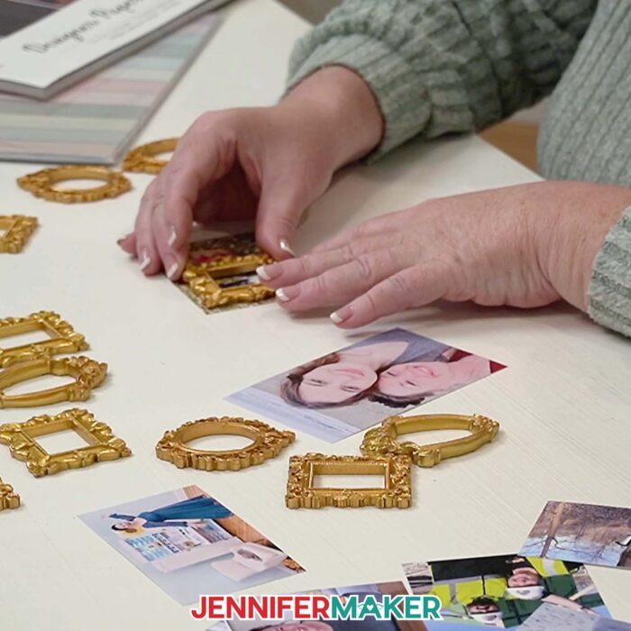 Close-up adding a gold mini frame on top of a personal photo.