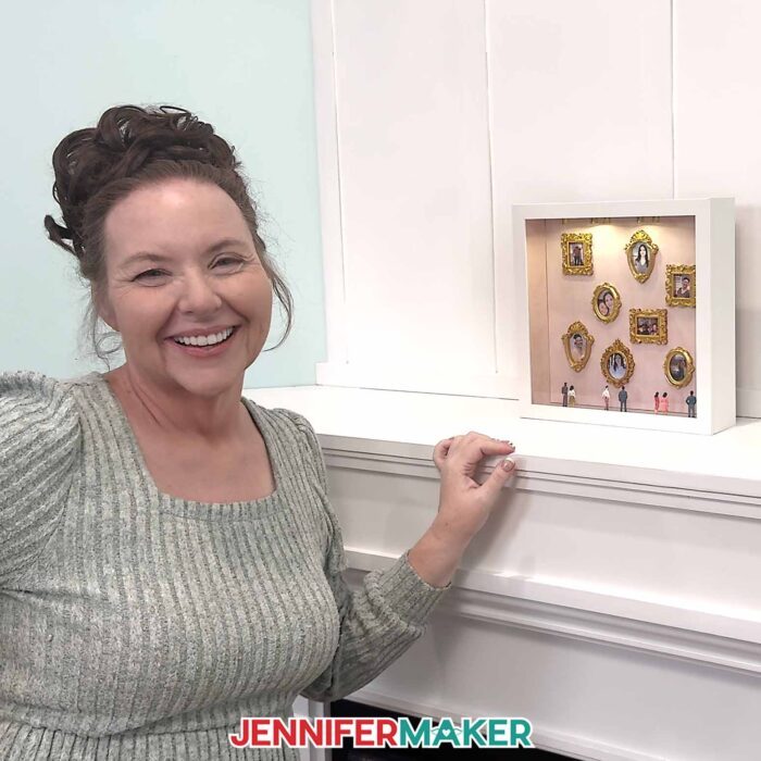 Jennifer displays her finished gallery of us shadow box on her mantel.