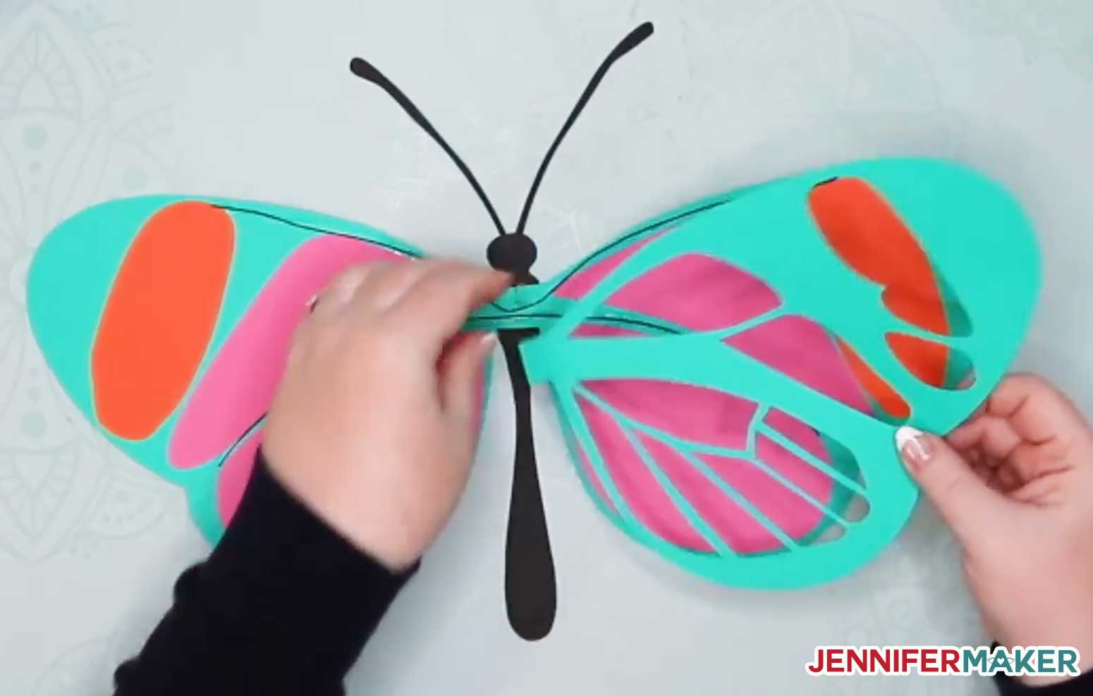 Place the back side of the wing on your giant paper butterfly