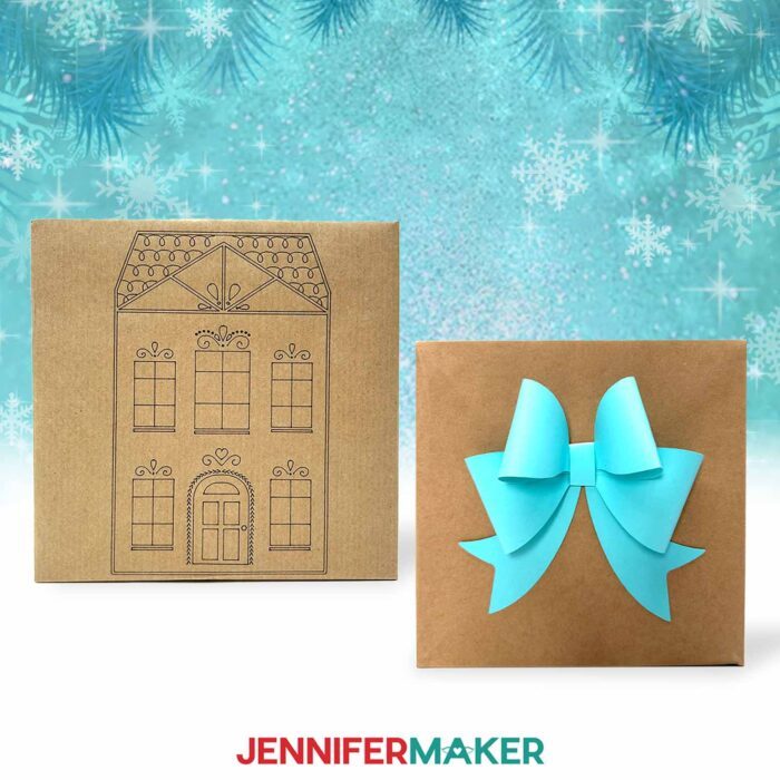 A box with a house design drawn on the front using a Cricut pen, and a box with a blue cardstock bow accessory.