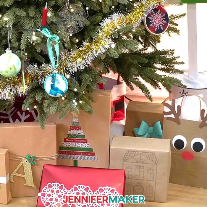 A variety of wrapped and decorated gifts under a tree.