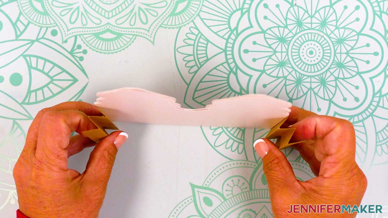 Make accordion folds on the sides of the gingerbread house pop-up card tree tier.