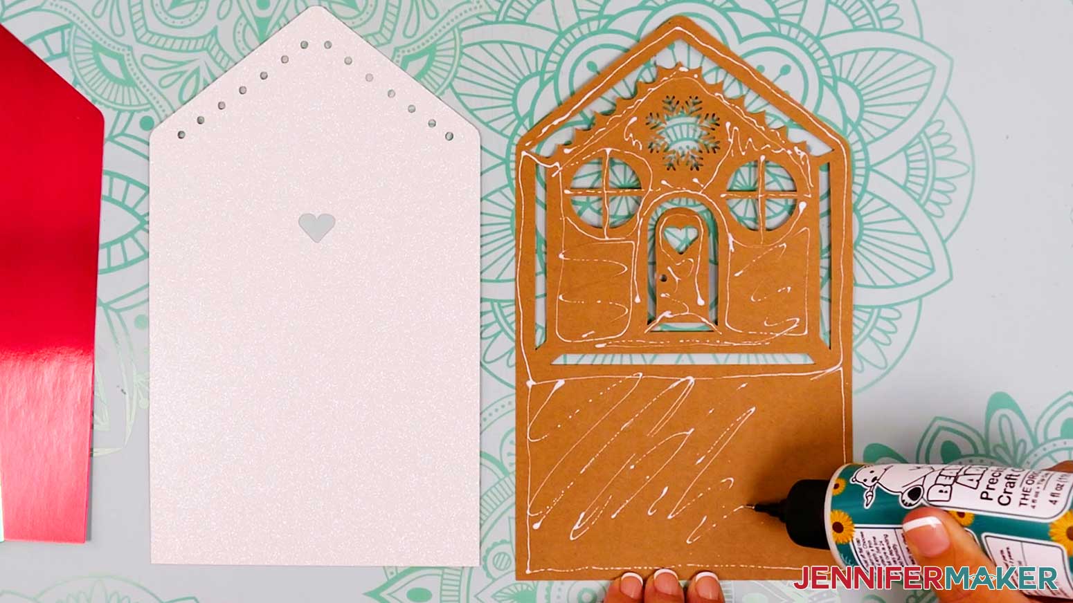 Add craft glue all over the back of the first house tier layer, close to the edges and around the cutouts.