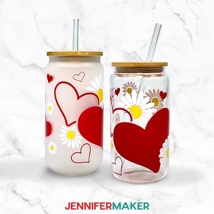 Glass cans with heart designs, clear with vinyl and frosted with sublimation.