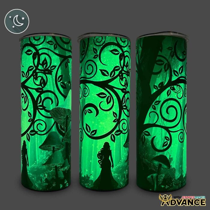 Three views of a Glow In The Dark Tumbler With Reverse Sublimation design of a woman in a spooky, enchanted forest with extra design details 