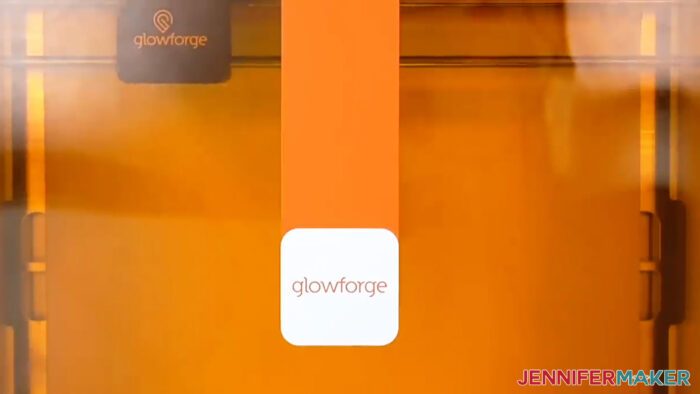 Orange lid offers eye protection for Glowforge Aura craft laser users.