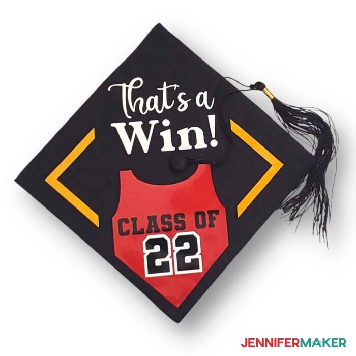 A graduation cap idea with That's a Win and a sports jersey.