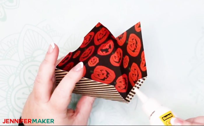 Gluing a cardstock treat box for the DIY Halloween Countdown Calendar