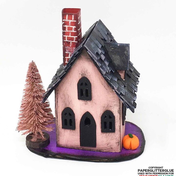 Halloween Paper Haunted House with pink stucco and a black roof