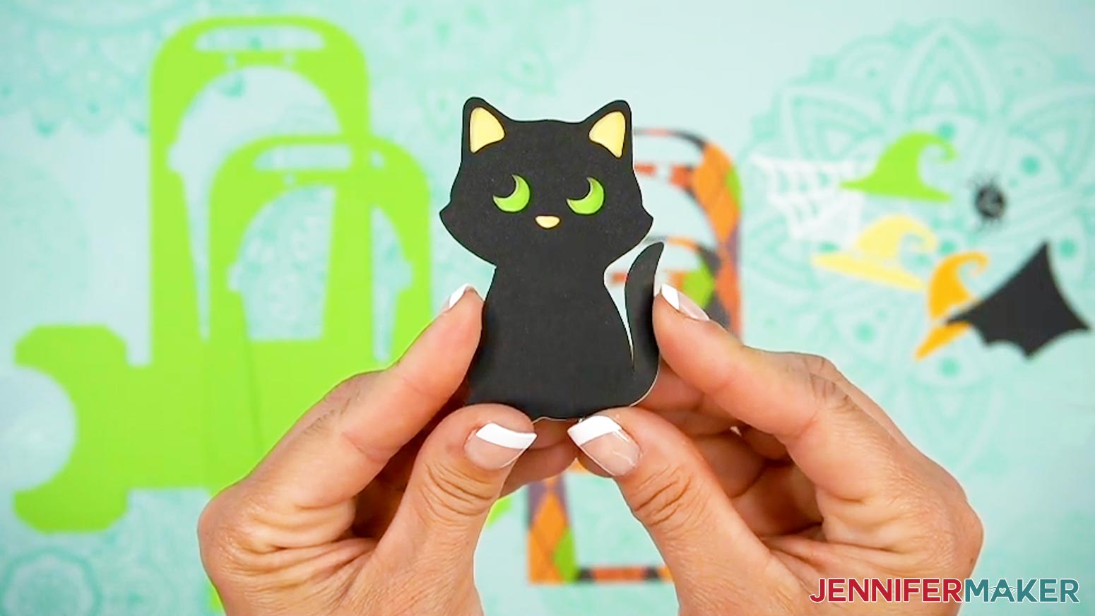 The Halloween treat cup holder cat embellishment is ready to assemble.
