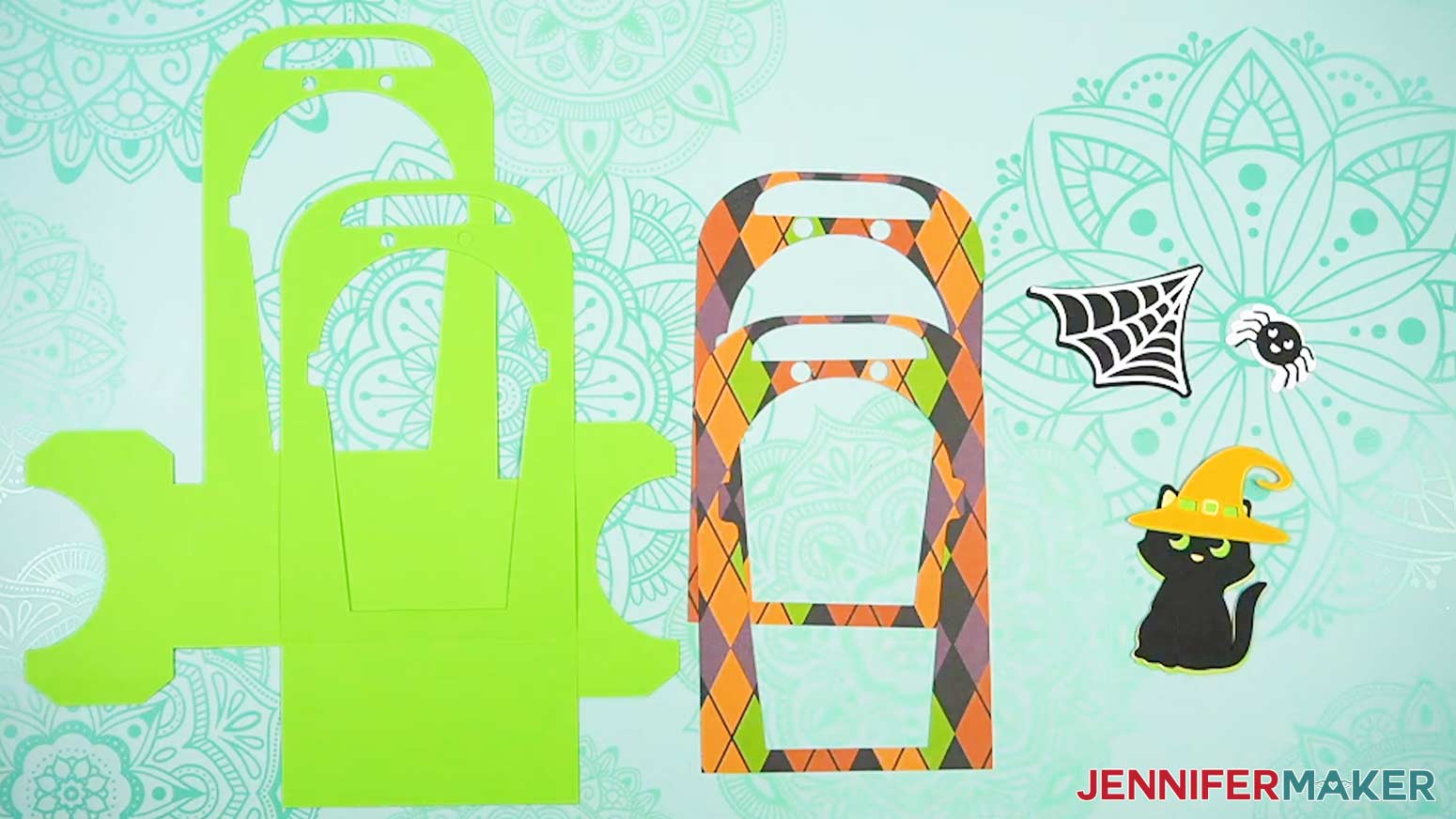 The embellishments for the Halloween treat cup holder are stacked and ready to assembled.