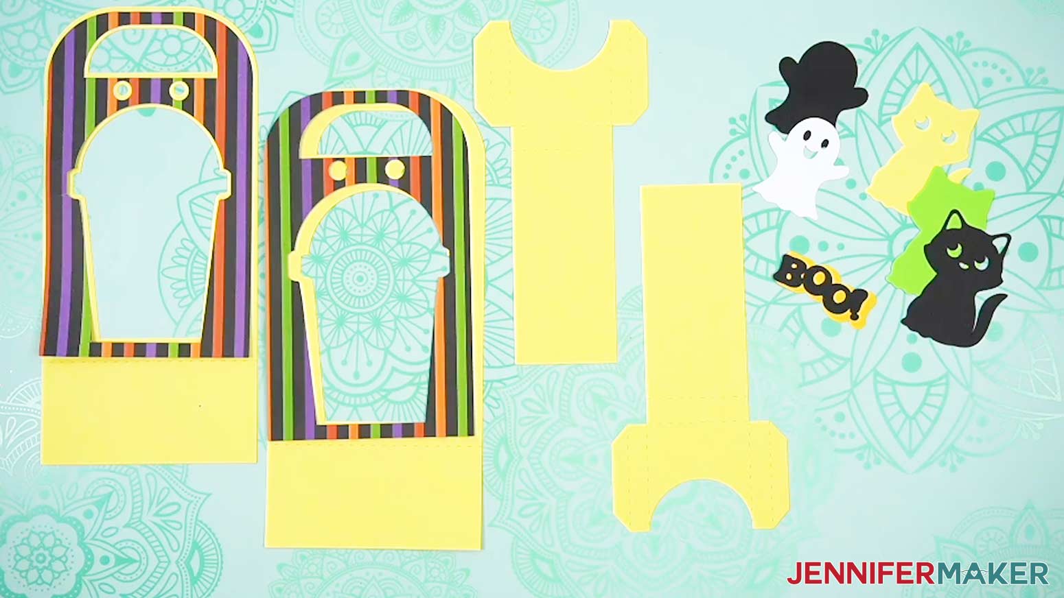 Arrange all the Halloween treat cup holder cut pieces to make sure they are all ready to assemble.