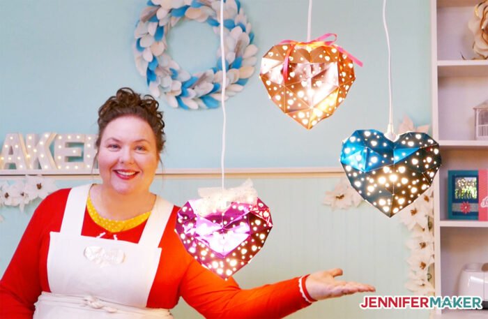 Jennifer Maker with her heart-shaped hanging paper lanterns made from metallic cardstock and Kraft board