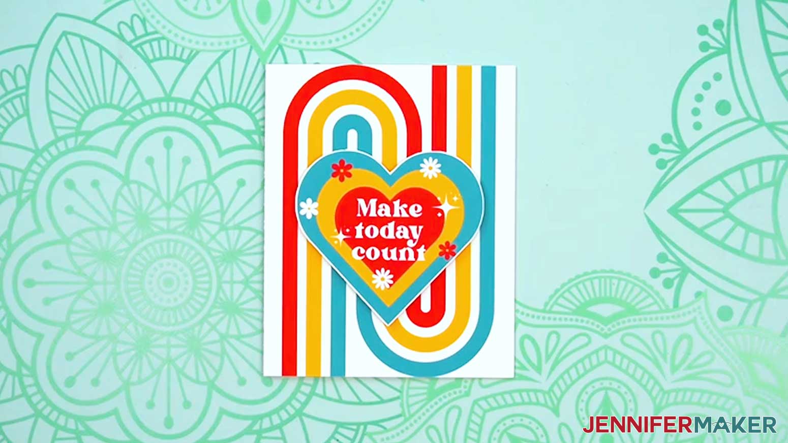 Attach the heart element to the card and the project is complete.