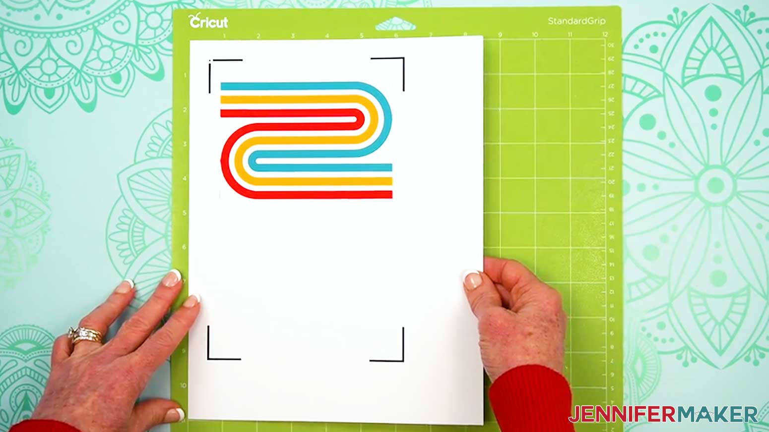 Place the printed card sheet on a green machine mat.