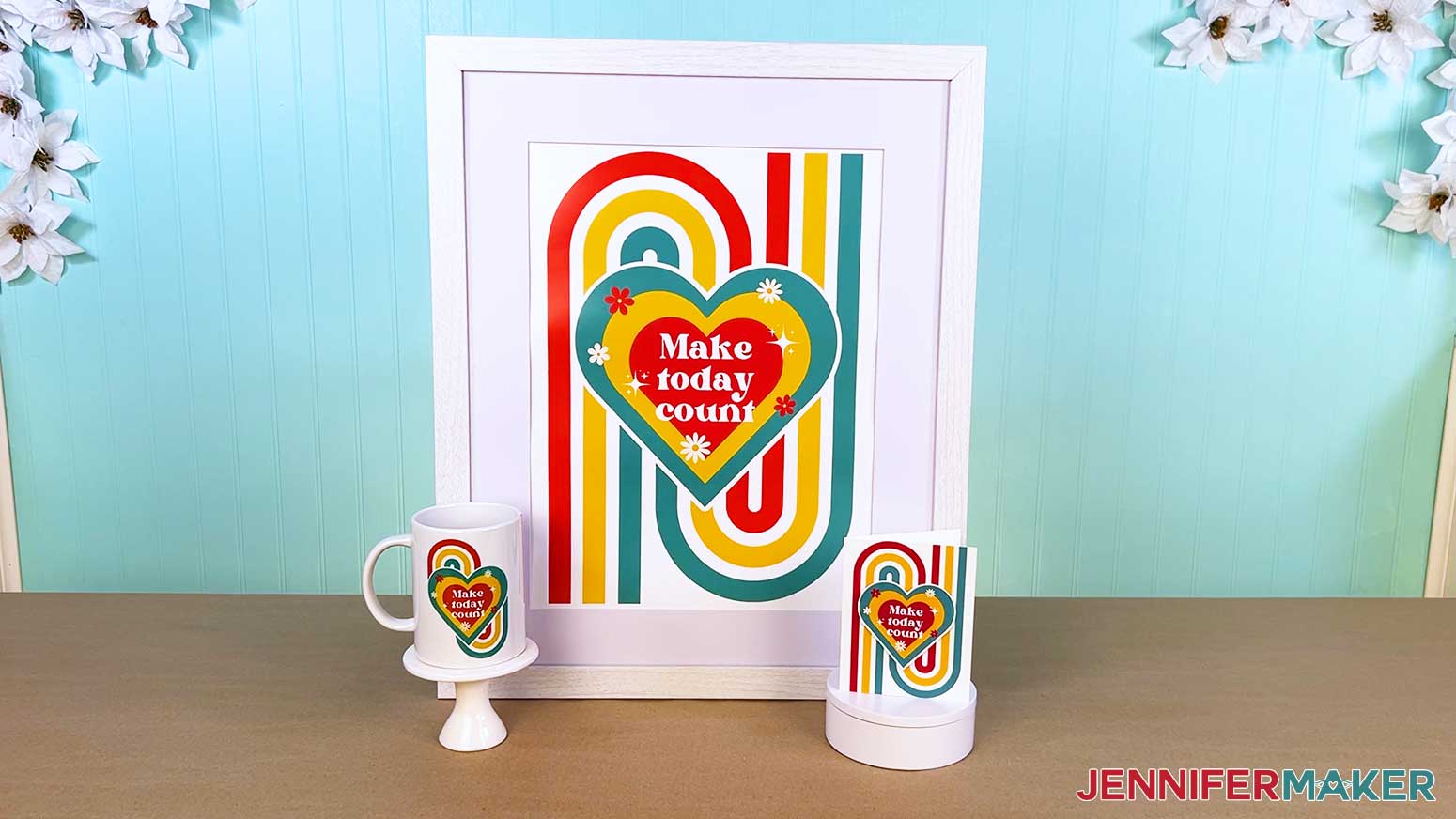 Finished mug, card, and poster with one design adapted three ways.