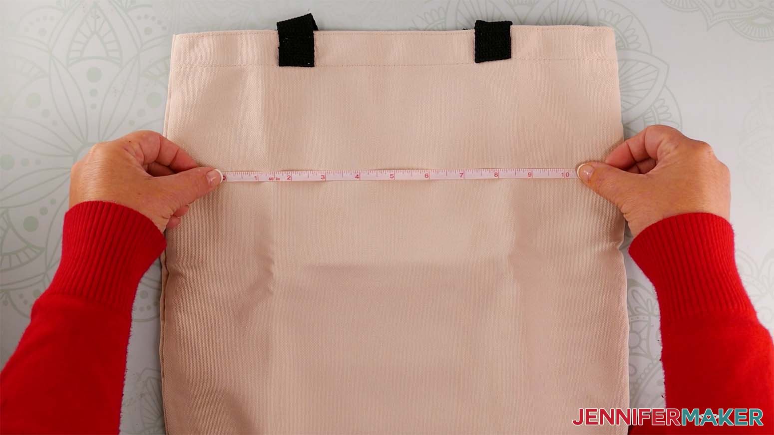 Image showing to use a measuring tape to measure the available space to use on the tote bag.