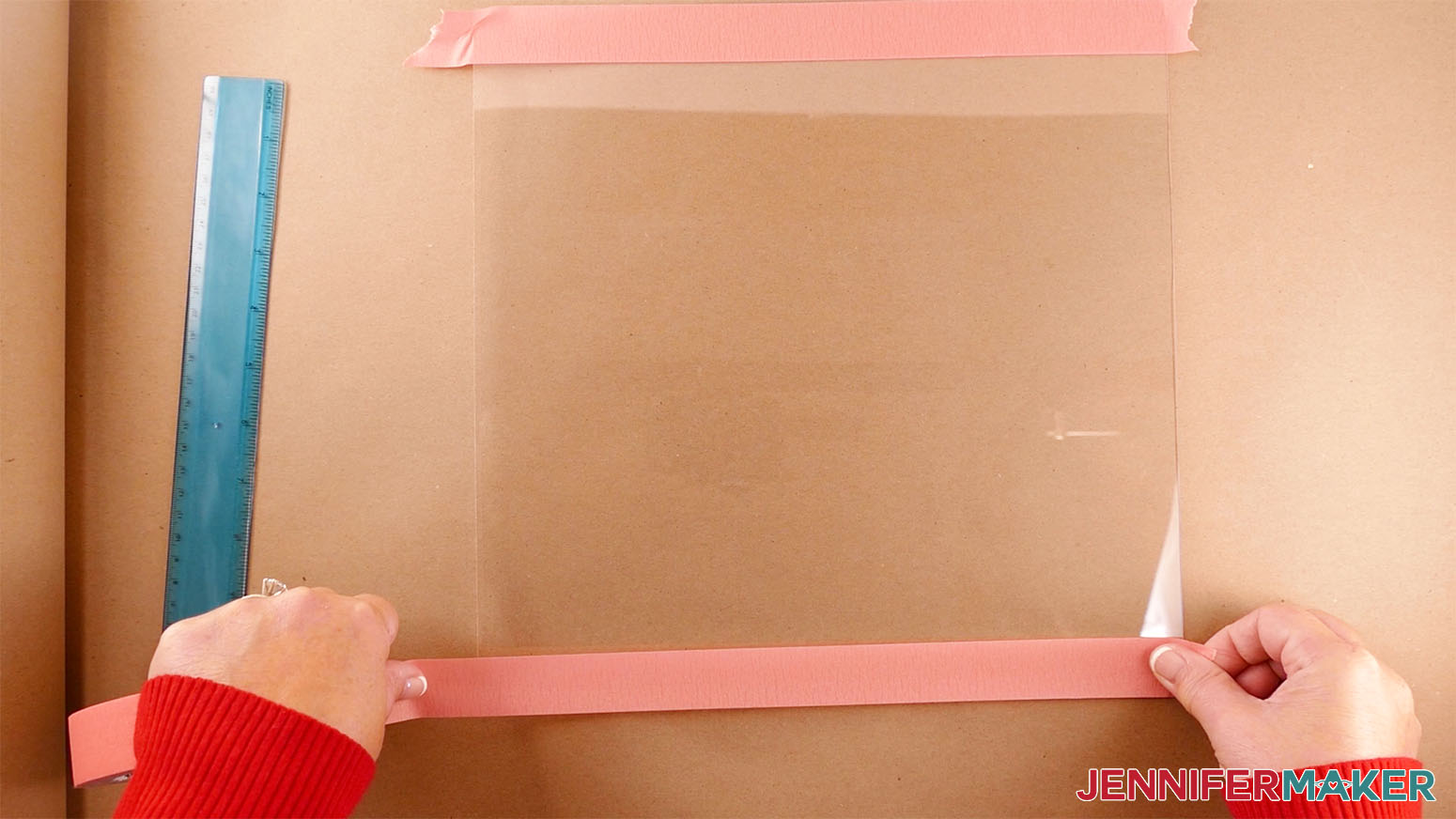 Image showing to lay down painters tape on the outside edges of the plexiglass to create guidelines.