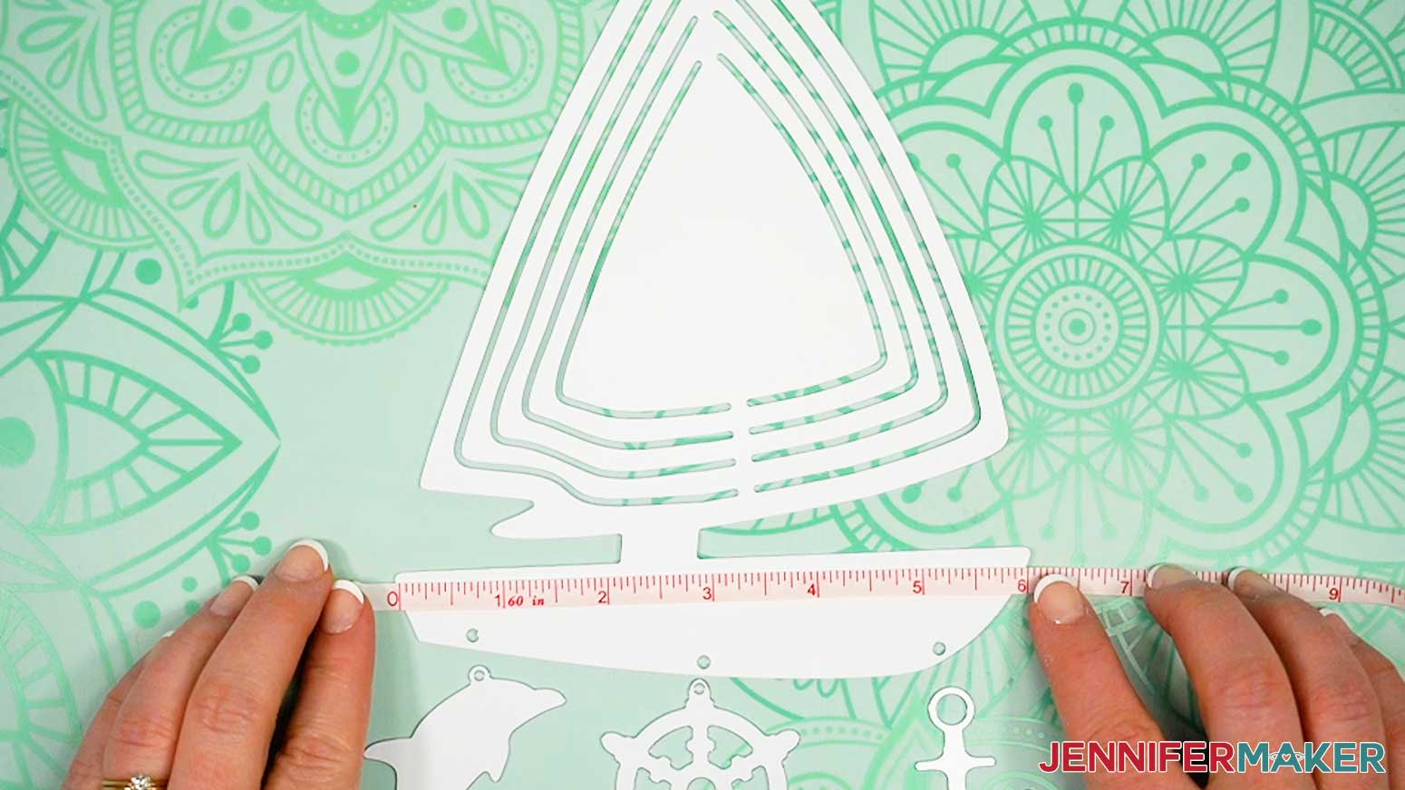 Measure the width of the shaped wind spinner.