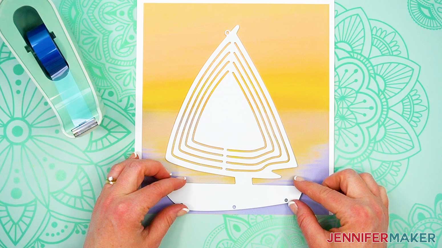 Align the shaped wind spinner over the printed design.