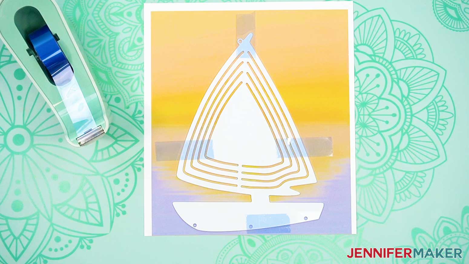 Securely tape the shaped wind spinner to the print out from the sublimation printer.