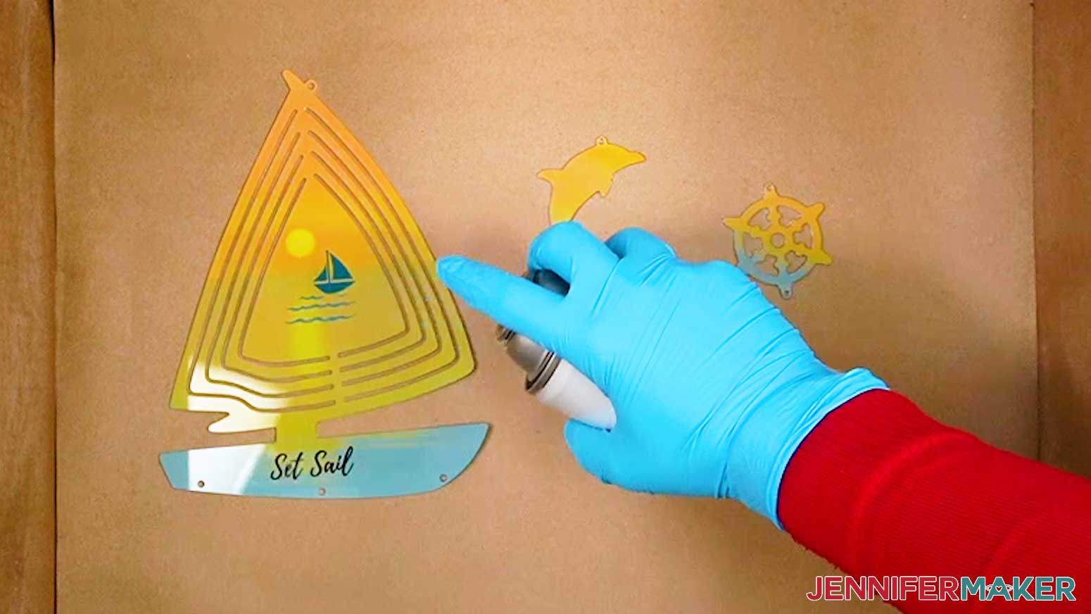 Spray the surface of the shaped wind spinner with a UV resistant clear coating to help preserve the vibrancy of the colors.