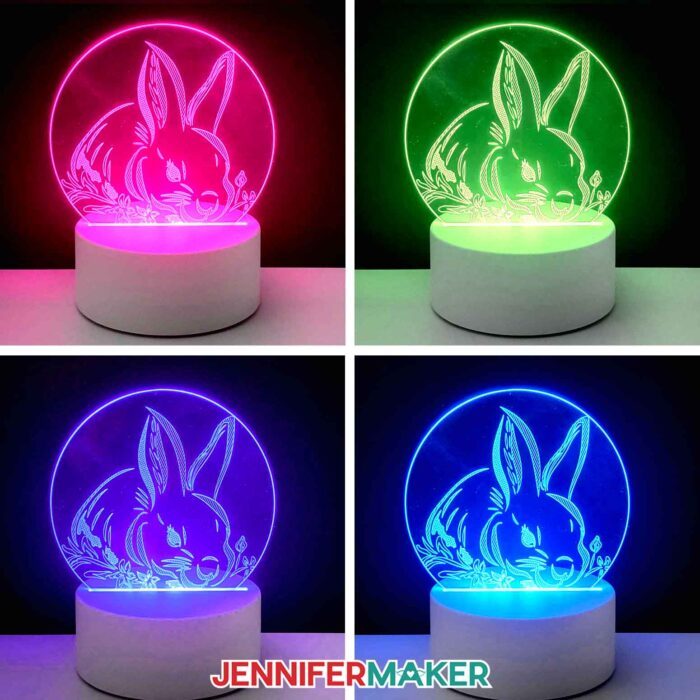 Learn how to engrave with a Cricut! A grid of four engraved nightlights with a rabbit on them are illuminated by different colored lights - pink, green, purple, and blue. Learn how to engrave with a Cricut with Jennifer Maker's new tutorial!