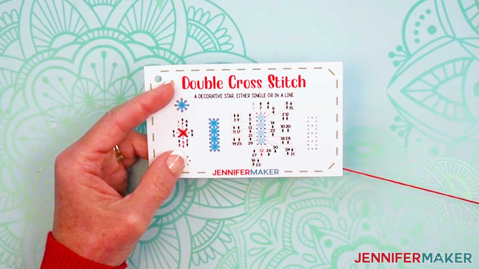 Follow the numbers to make an ex shape with the needled and thread on the Embroidery Stitch Book Double Cross Stitch card.