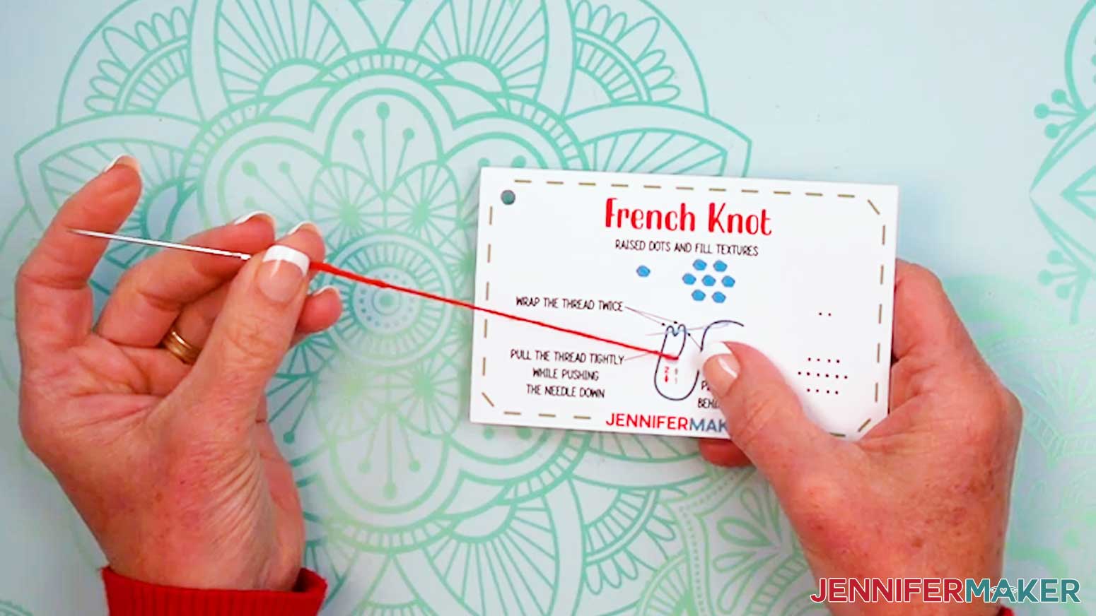 Pull the thread up and to the left through the first hole of the Embroidery Stitch Book French Knot page.