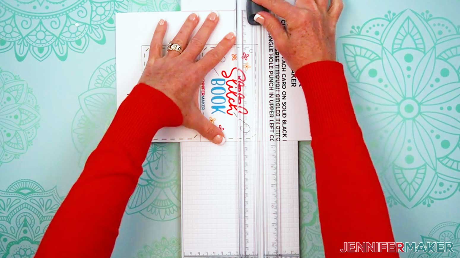 Use a paper trimmer to cut the pages of the Embroidery Stitch Book apart at the solid black lines.