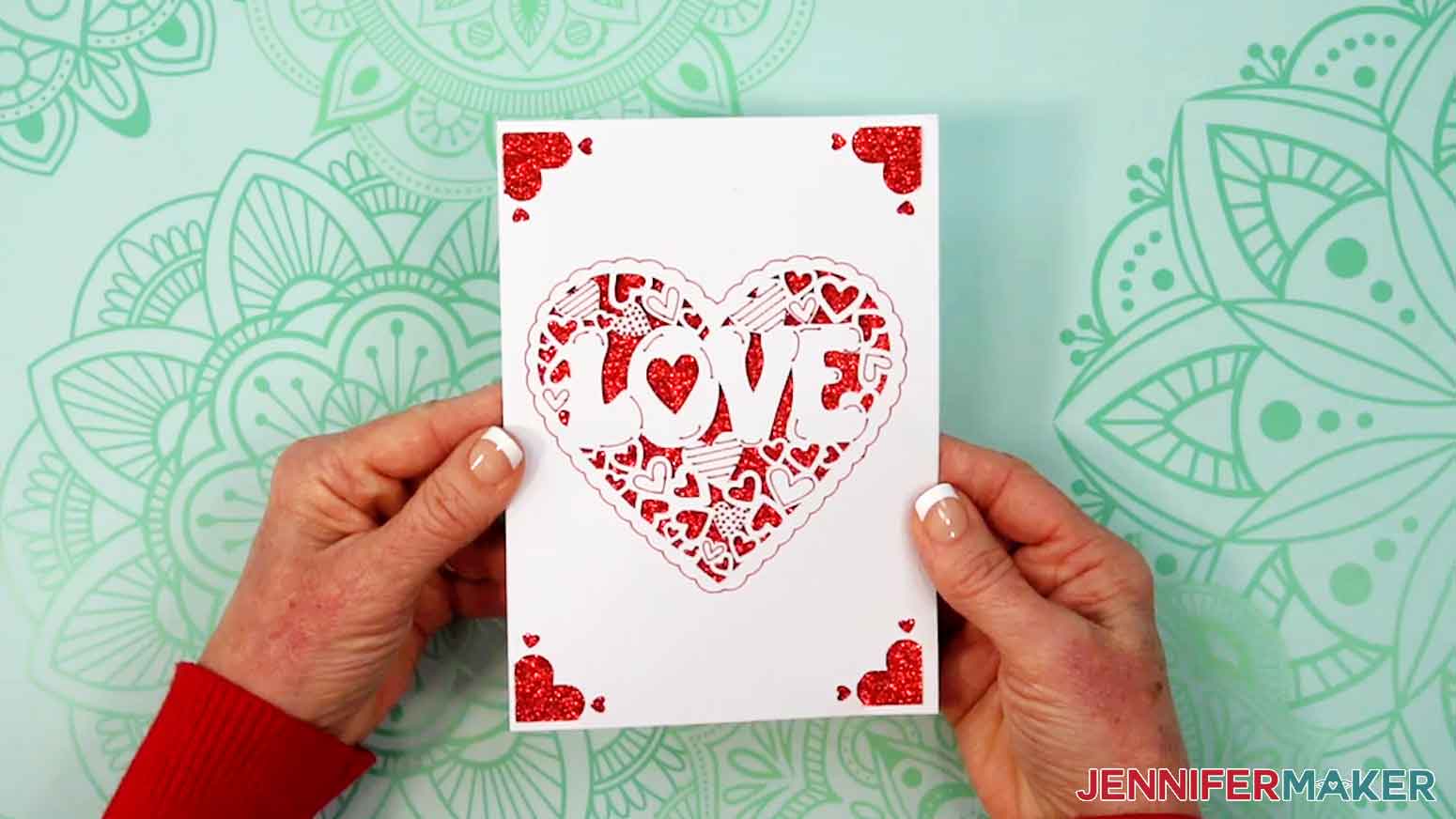 The insert has been added to the card outer and the completed card is held up.