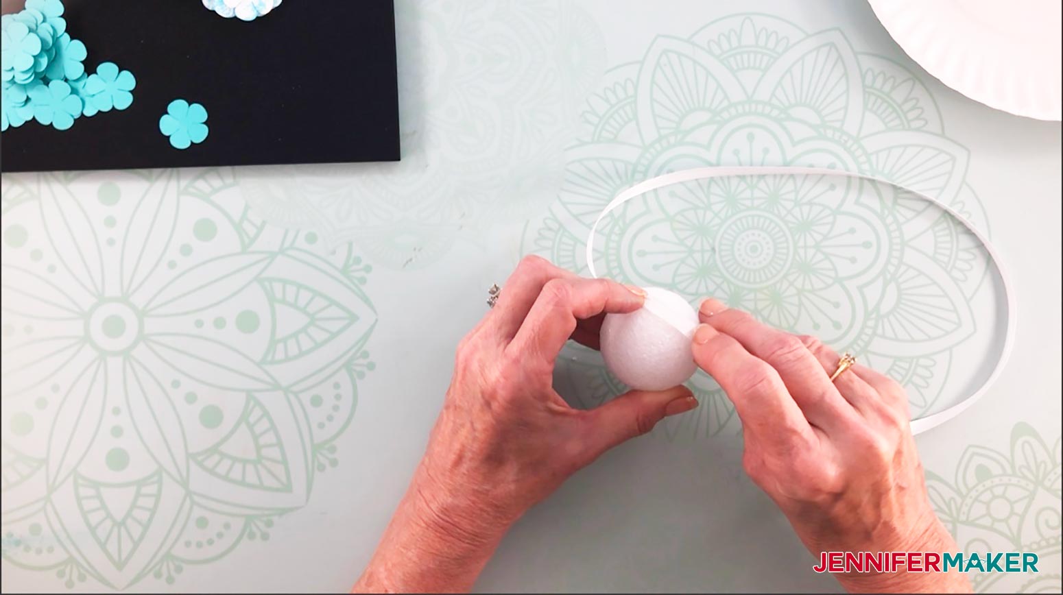 Make paper hydrangea flower and glue ribbon to the styrofoam ball