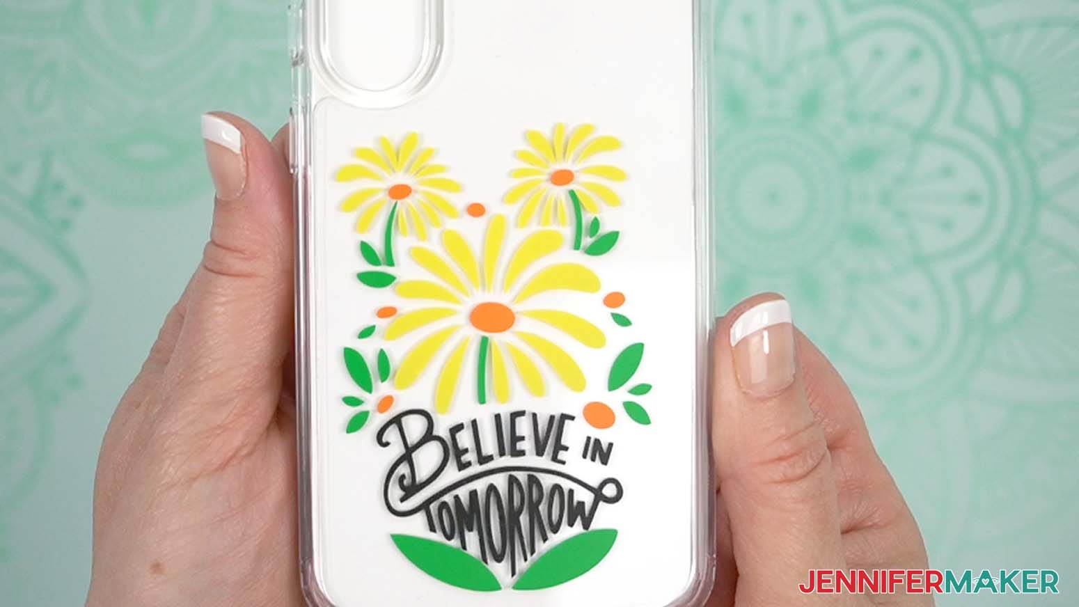 vinyl flower design with words believe in tomorrow on a phone case