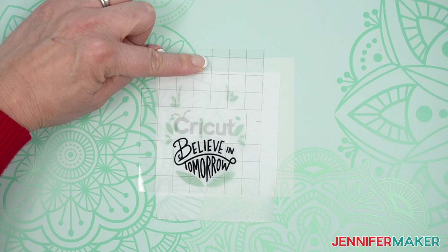 When the layers line up, press the exposed section of transfer tape onto the bottom carrier sheet