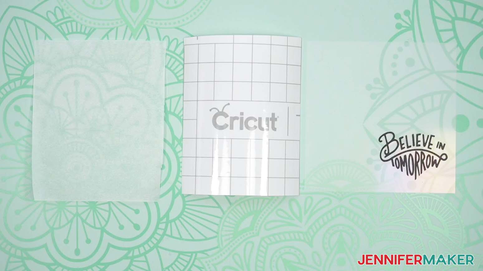 Cut a piece of StandardGrip transfer tape and a piece of parchment paper just larger than the decal.