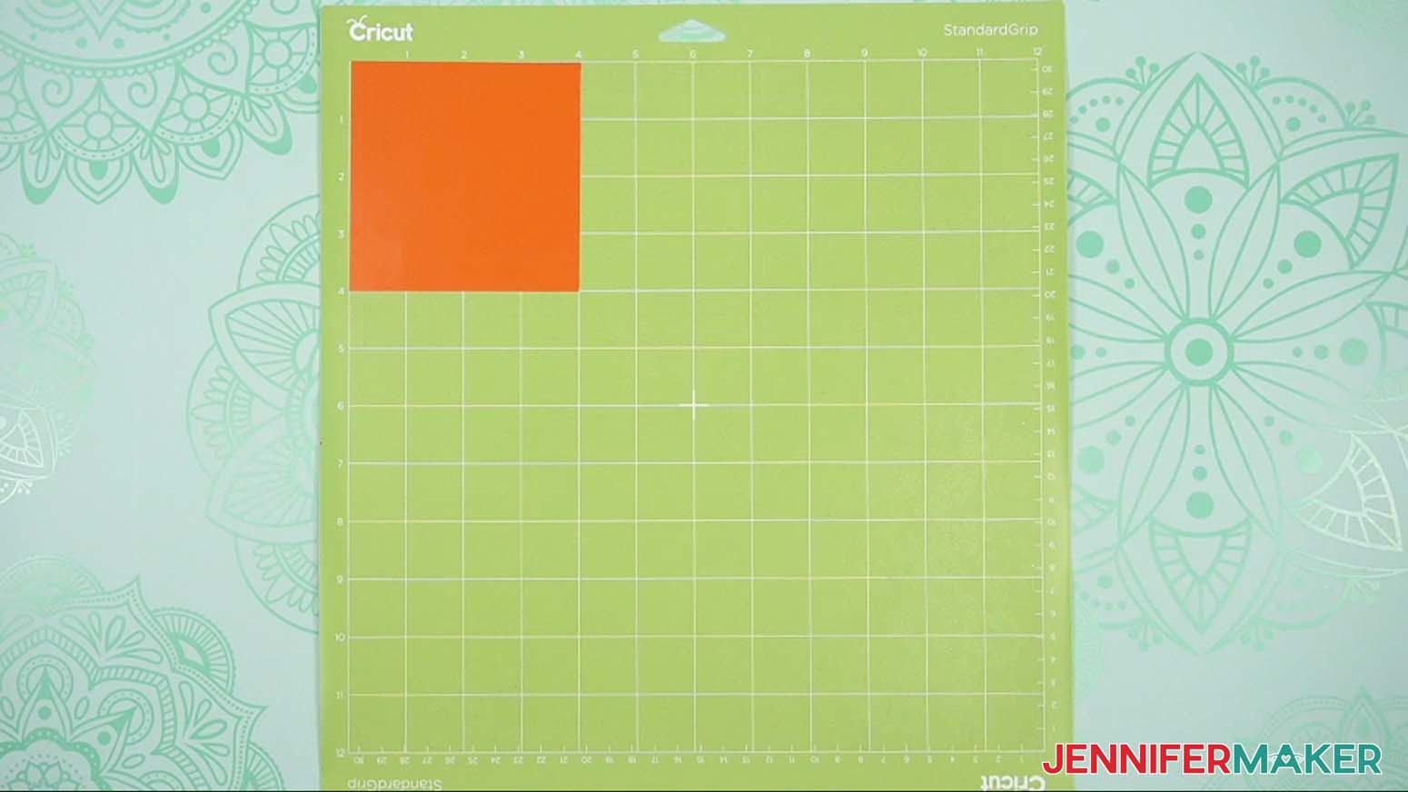 Place your first vinyl piece face-up in the top left corner of a green StandardGrip machine mat