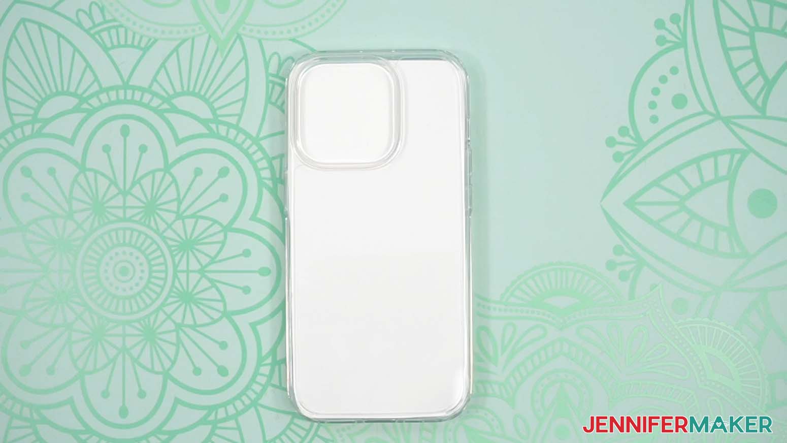 Lay the phone case on your work surface flat-side-up with the camera&rsquo;s cutout area at the top.