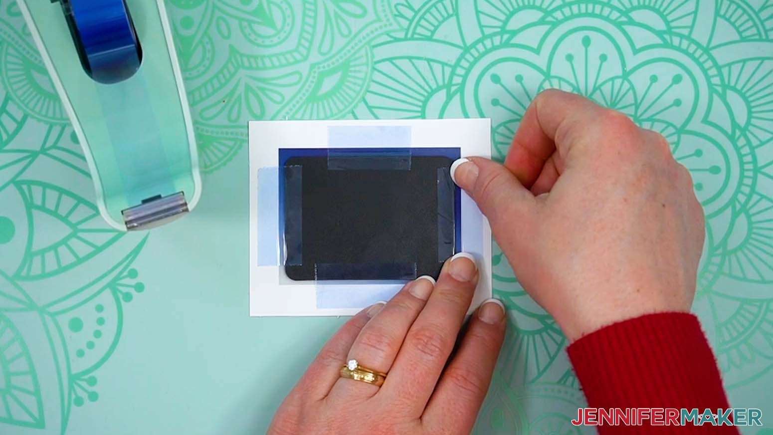 Use heat resistant tape to secure the magnet to the sublimation print.