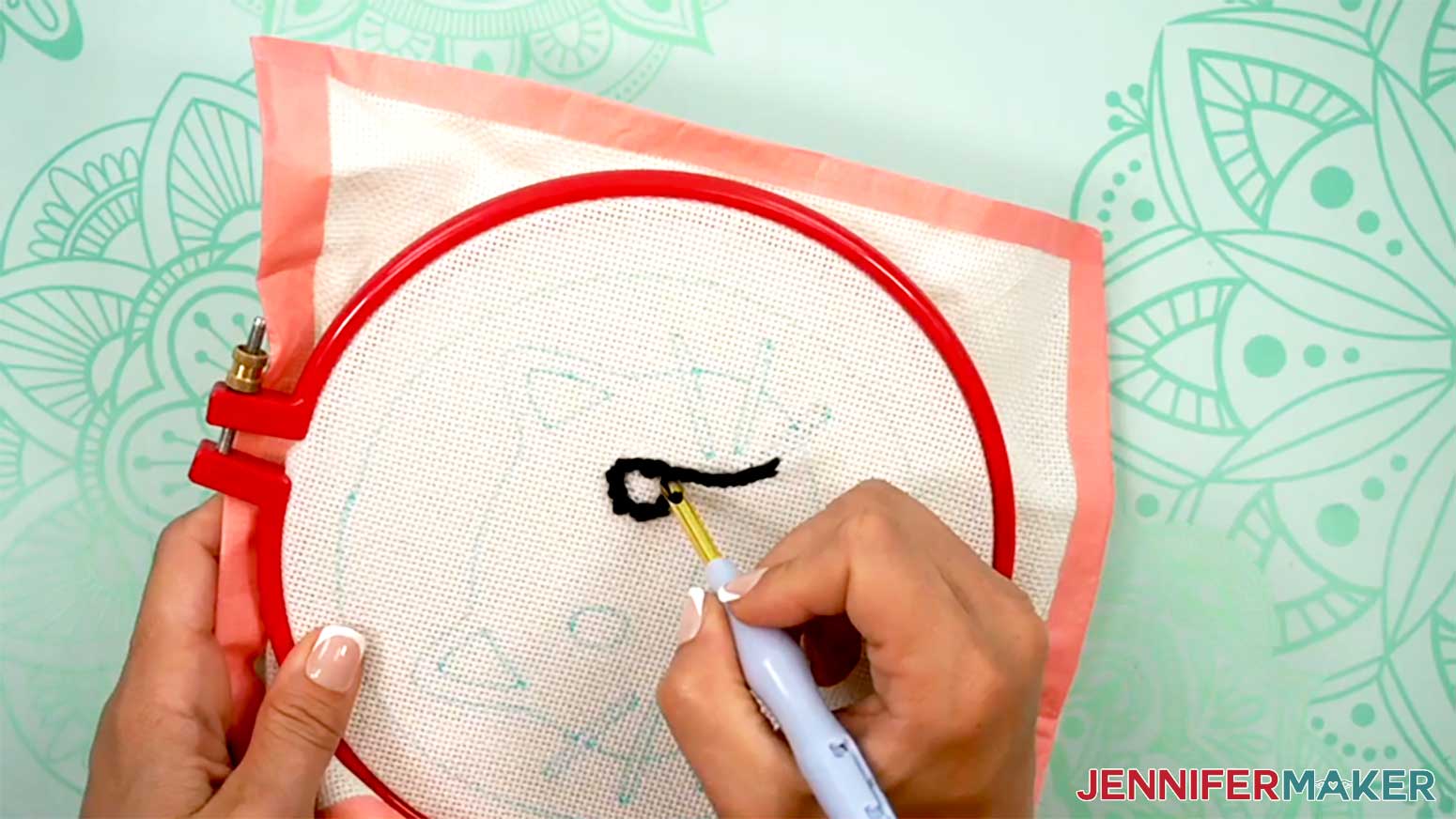 Continue stitching by following around the outline of the eye of the Cat Punch Needle design.