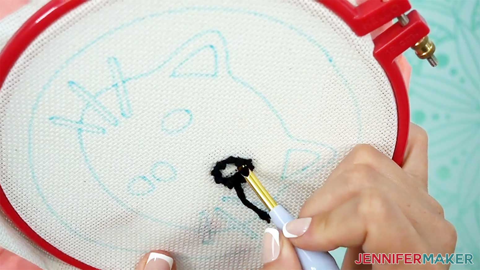 Continue the stitches by slightly moving the needle over and working next to the original stitch lines when stitching the punch needle design.